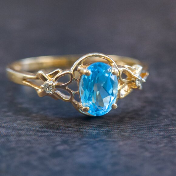 Imperial Gold Co. Jewelry - 14k Gold Oval Blue Topaz Ring with Diamond Accents